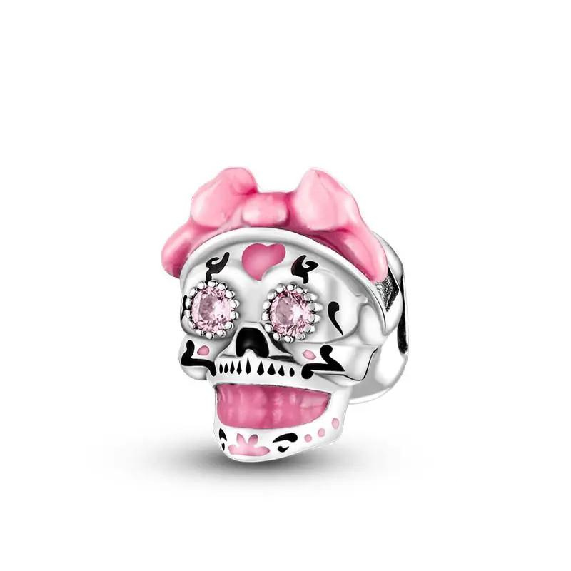 Berloque com caveira rosa, da Myzoria