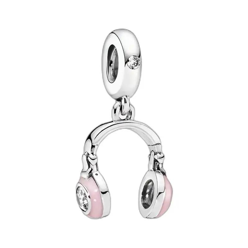 Berloque com fone de ouvido rosa, da Myzoria